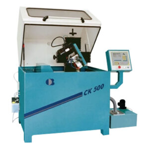 Slitter + core cutters. Match grind multiple knives to same diameter. sharpener